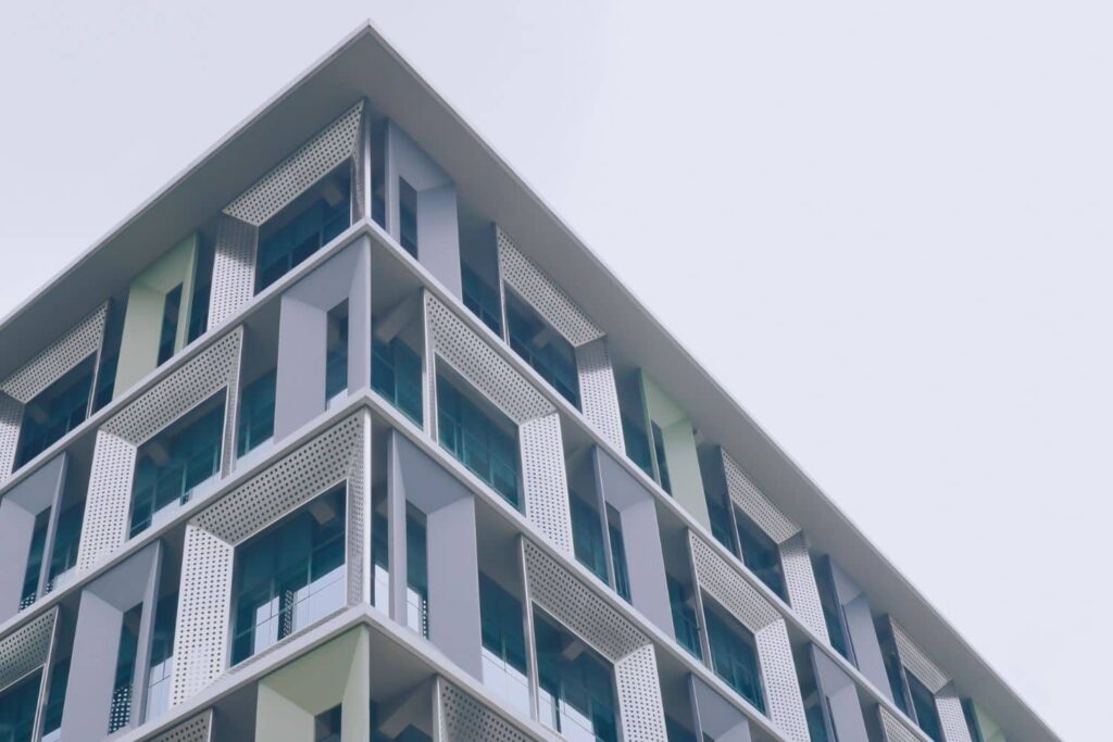 Modern multi-story building exterior illustrating the types of facilities covered in a comprehensive commercial property inspection report from America’s Choice Inspections.